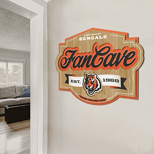 Cincinnati Bengals Fan Cave sign on wall in living room.
