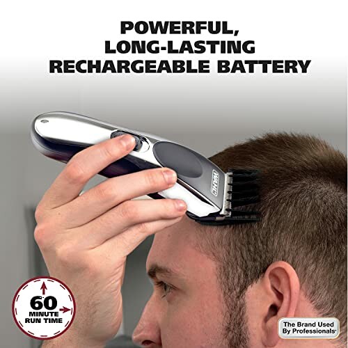 Person using hair clipper with rechargeable battery