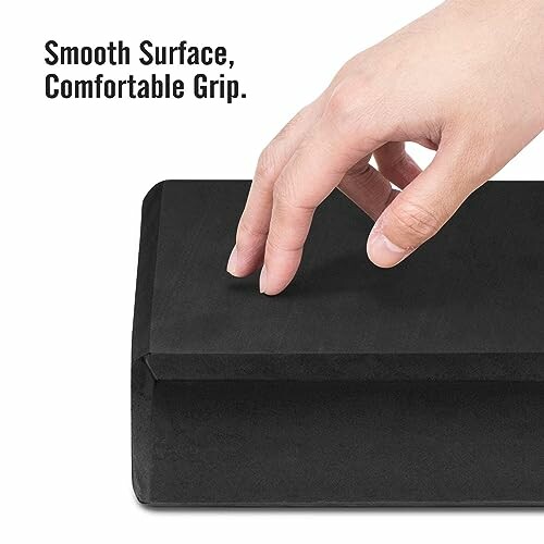Hand resting on a black surface with text 'Smooth Surface, Comfortable Grip.'