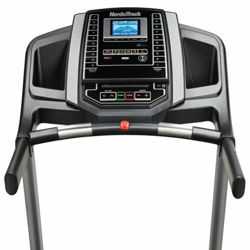 Close-up of NordicTrack treadmill console with digital display and controls.