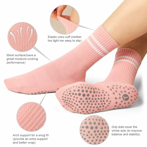 Pink grip socks with features highlighted including elastic crew cuff, mesh surface, arch support, and grip dots.