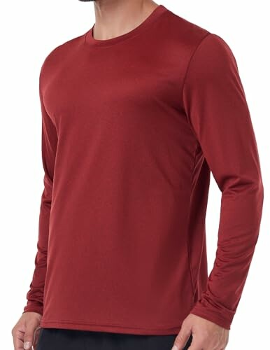Person wearing a red long-sleeve shirt