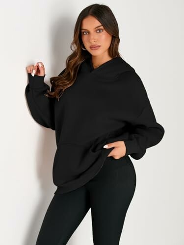 Woman wearing a black hoodie