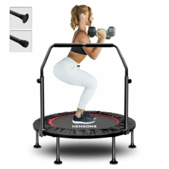Woman exercising on a trampoline with dumbbells