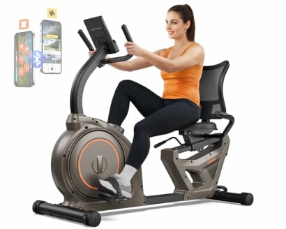 Woman exercising on a recumbent bike with a screen and phone holder.